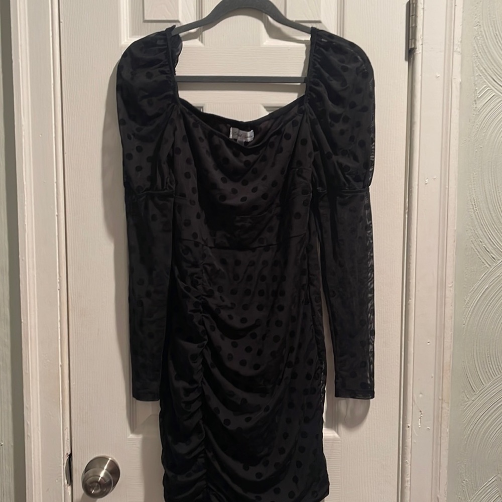 Mid thigh length dress with puffy sheer polka dot sleeves